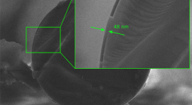 MEB image of a silica microfiber section coated with a 48 nm thick layer of TiO2